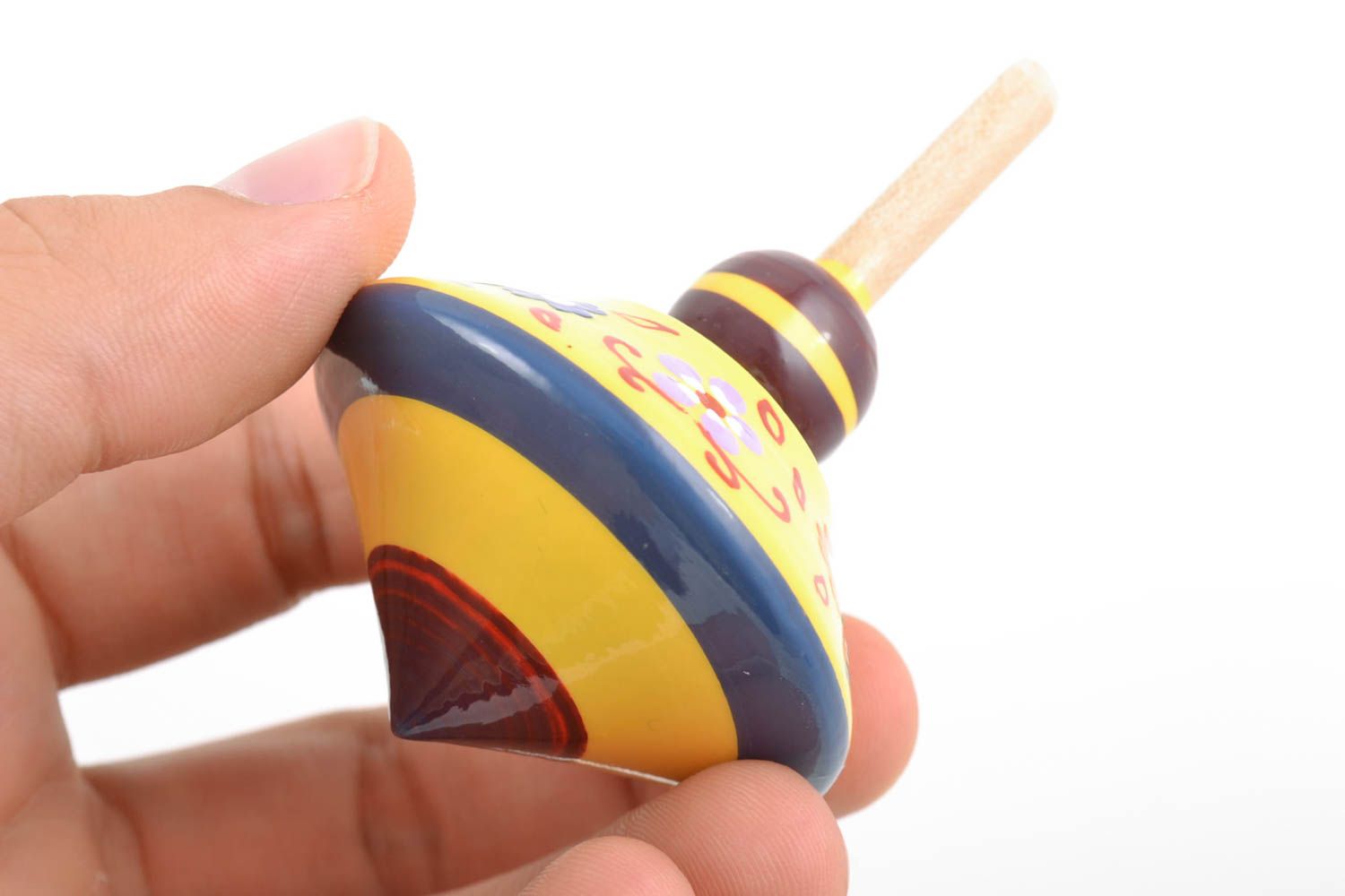 Handmade small painted with eco dyes wooden yellow spinning top toy for kids photo 2