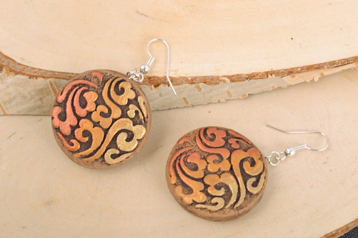 Handmade ethnic round ceramic dangling earrings with relief ornament for women photo 1