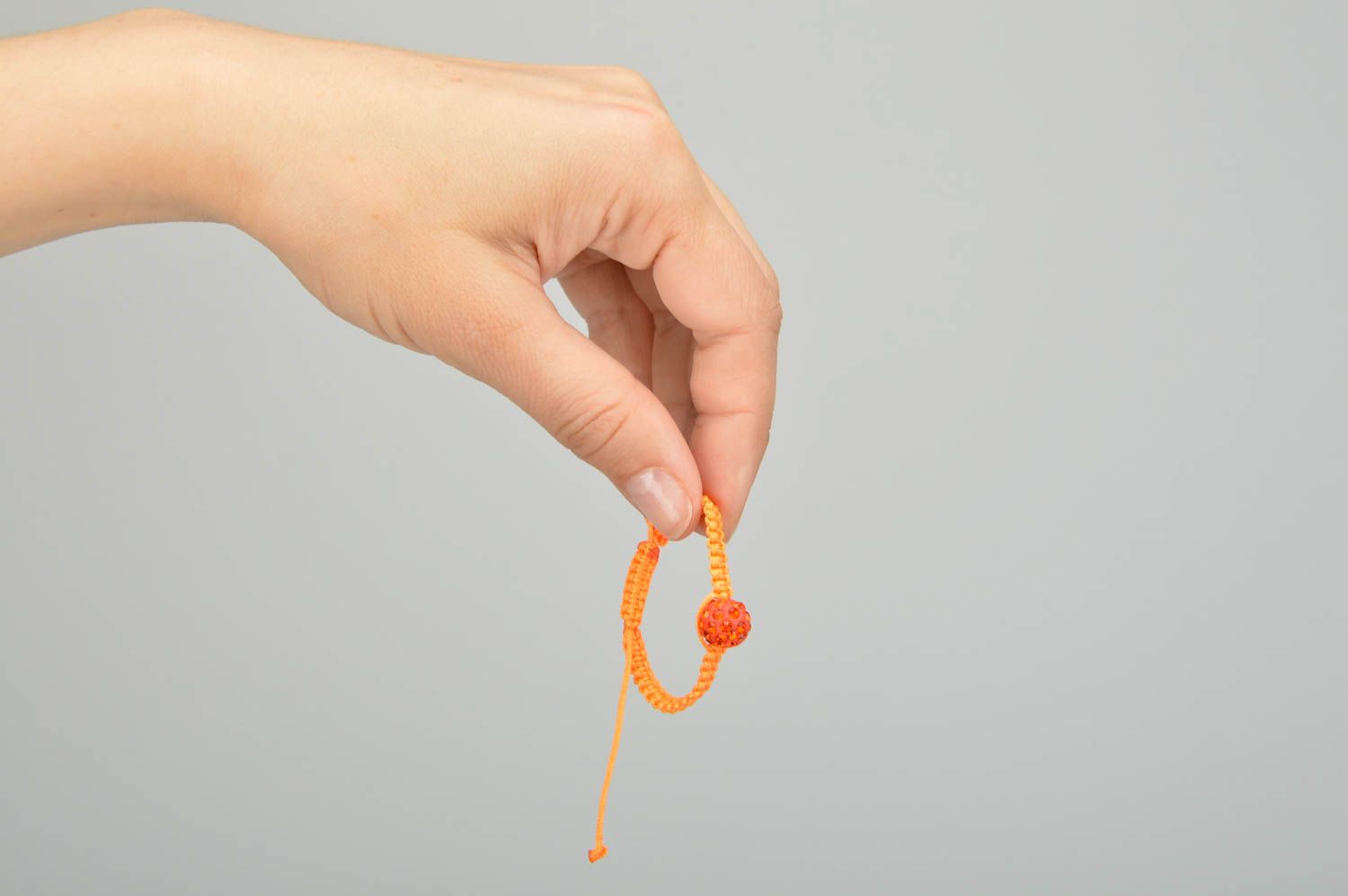 Wachs Schnur Armband in Orange mit regulierbarer Größe handgemacht geflochten foto 2