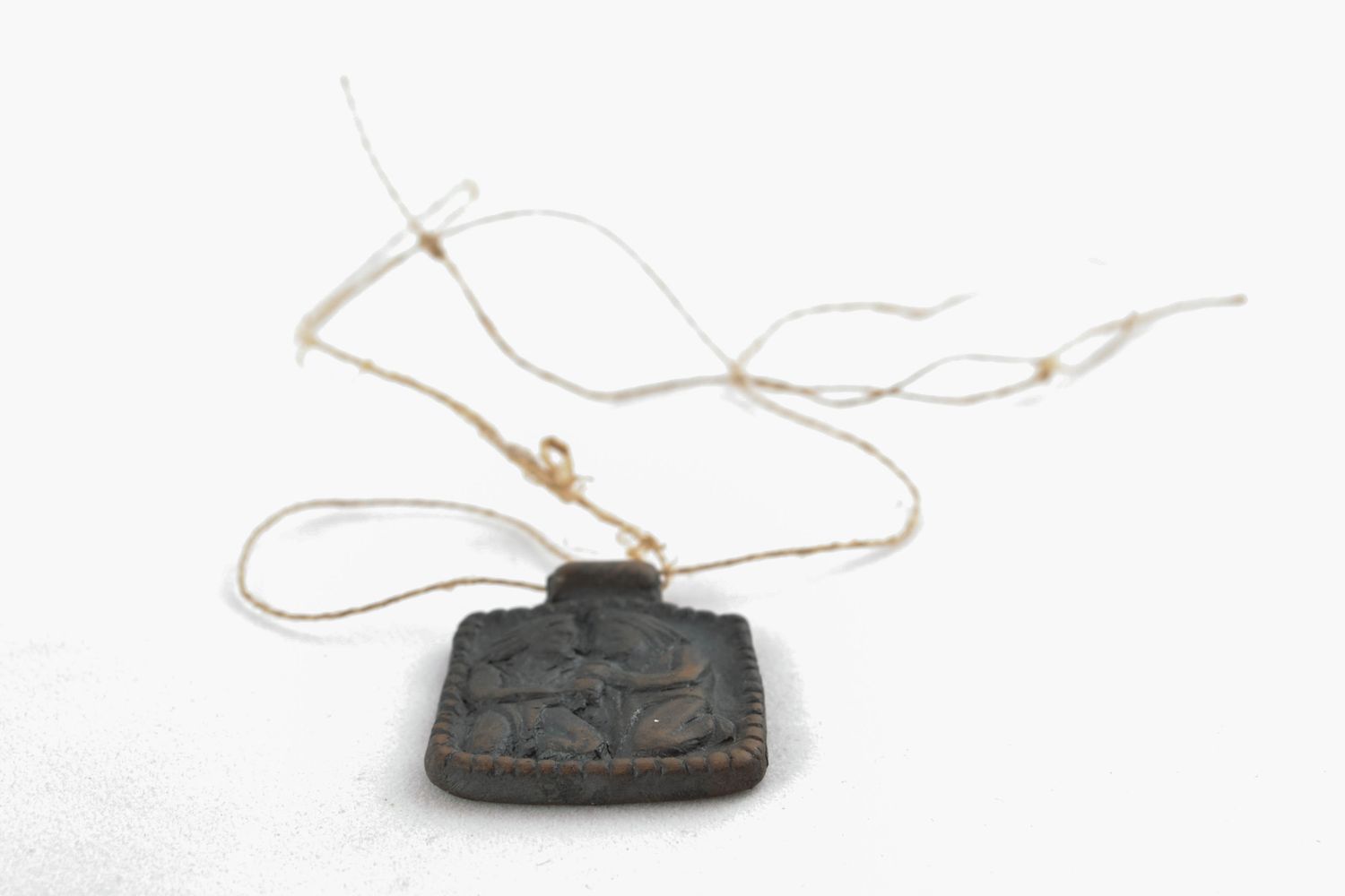 Ethnic pendant made of black-smoked ceramics photo 3