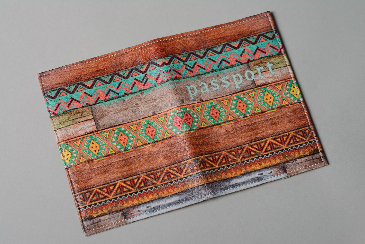 Homemade leather passport cover with ethnic ornament photo 2