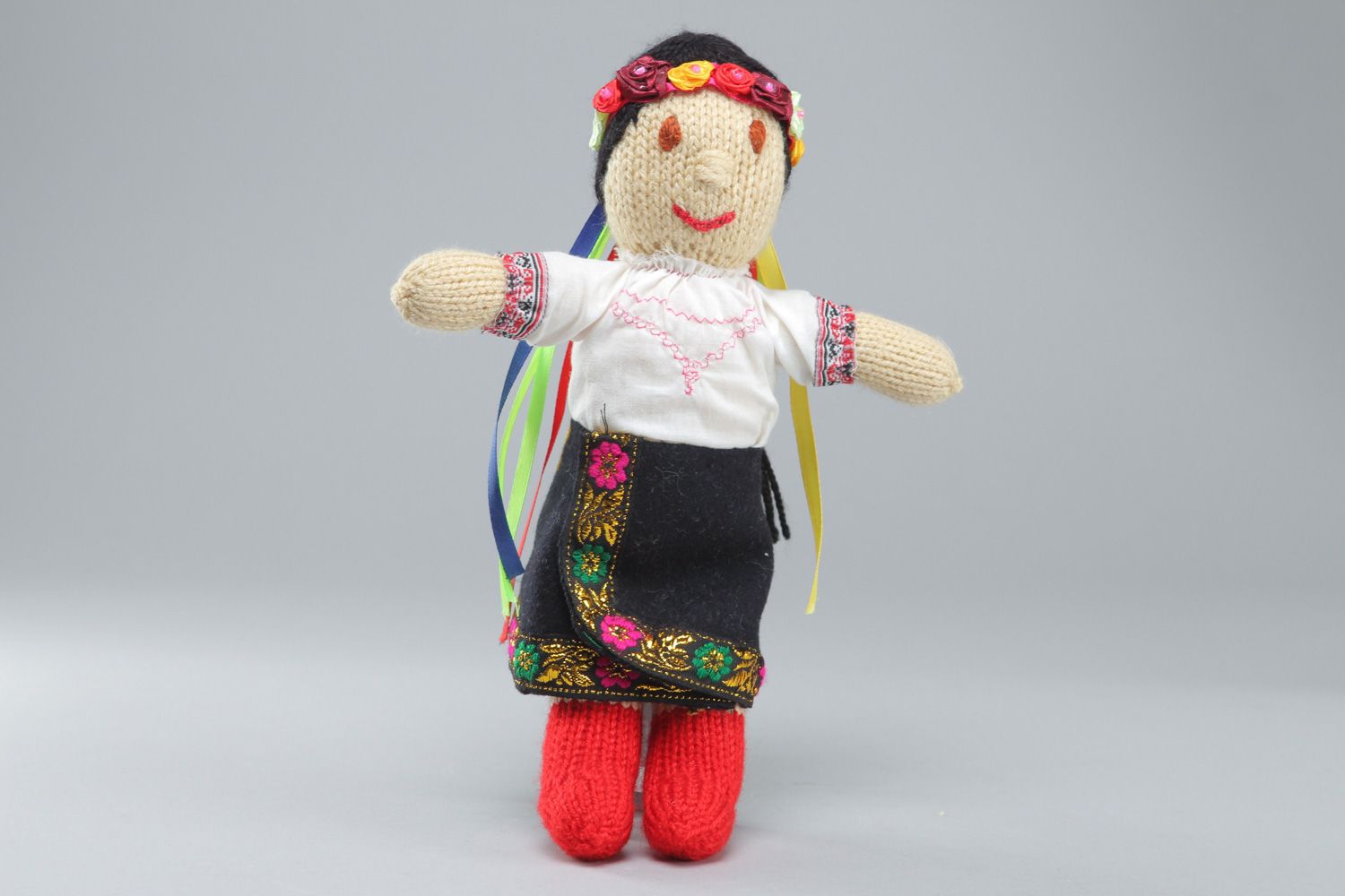 Handmade soft doll knitted of acrylic threads Ukrainian girl in national costume photo 1