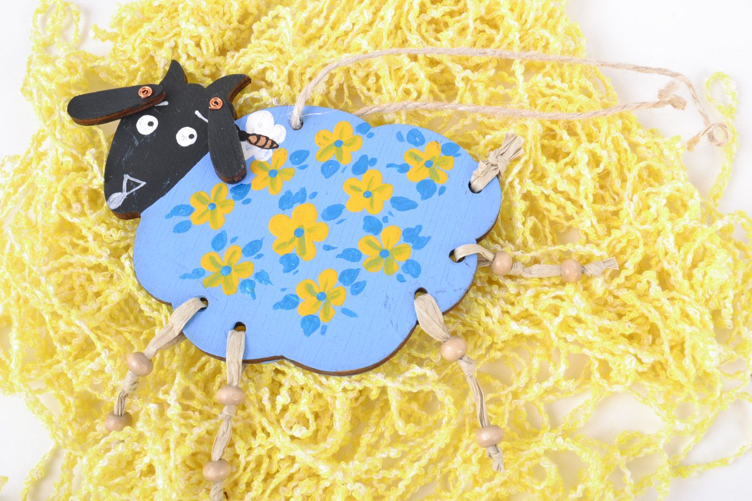 Homemade decorative painted wooden wall hanging blue lamb with yellow flowers photo 1