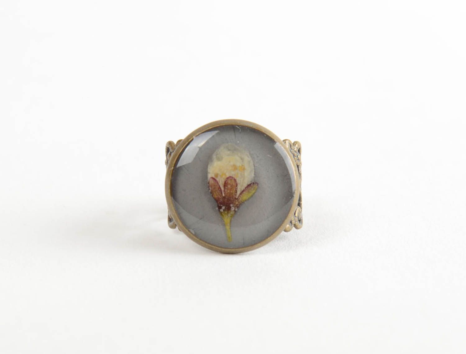 Homemade small round grey epoxy resin ring with flowers inside   photo 3