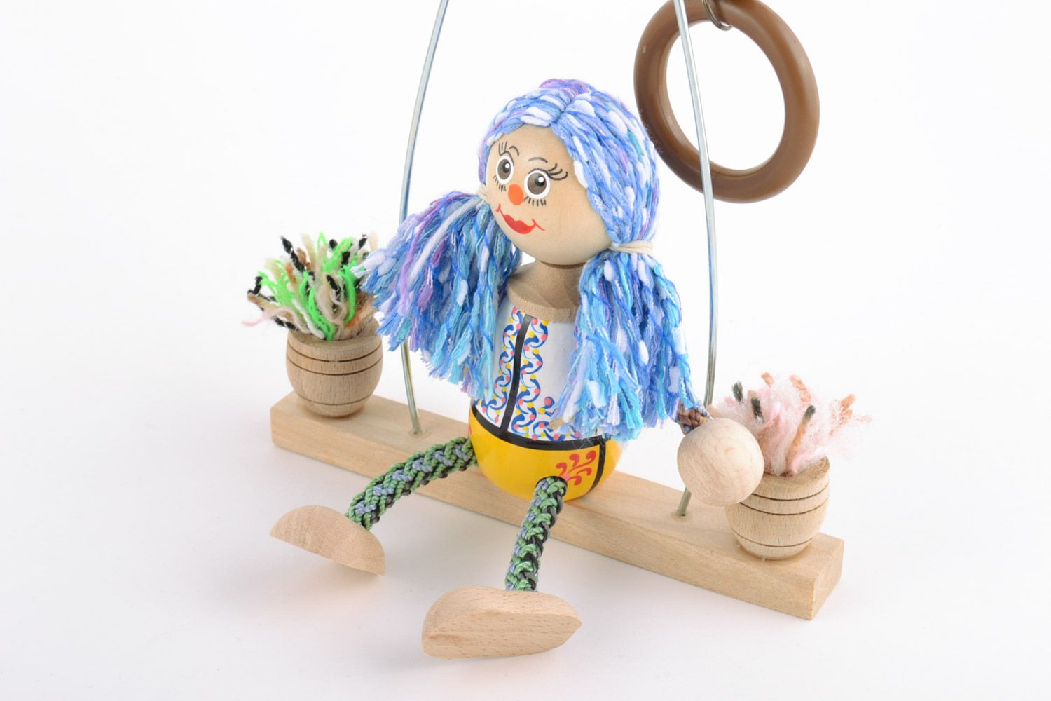 Handmade decorative beautiful wooden eco doll on the bench with hand-painting photo 3