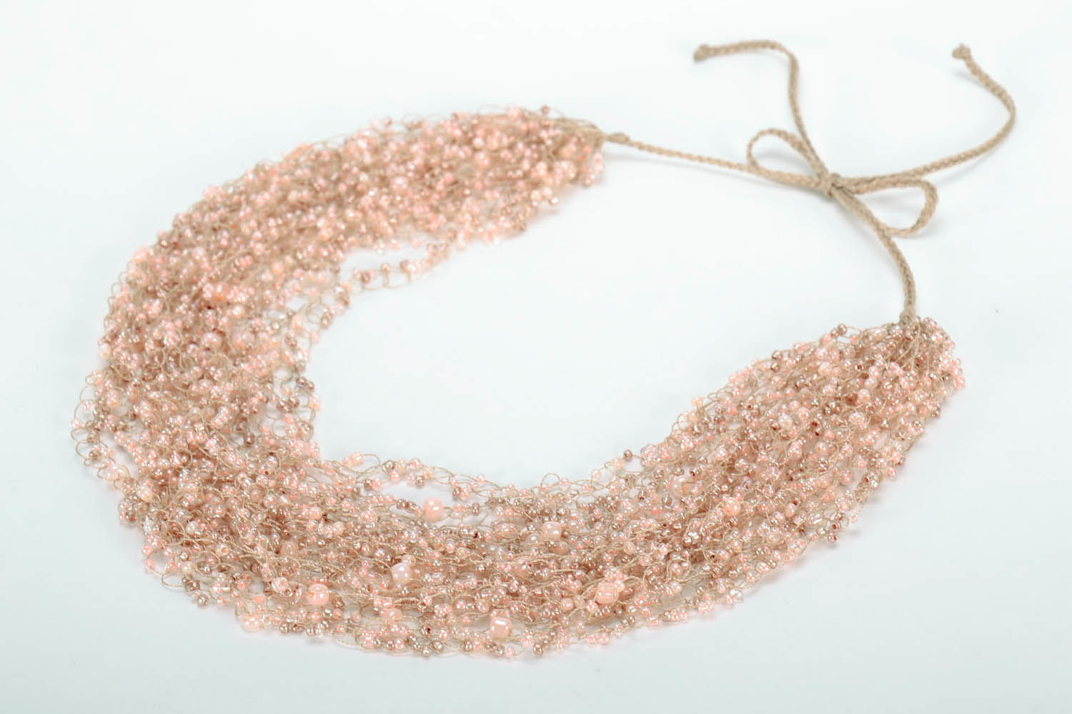 Beige necklace made of beads photo 4