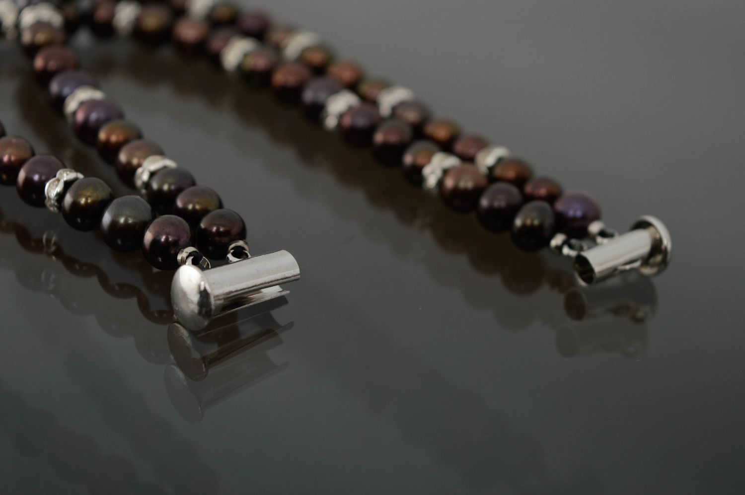Designer bracelet with dark pearls photo 4