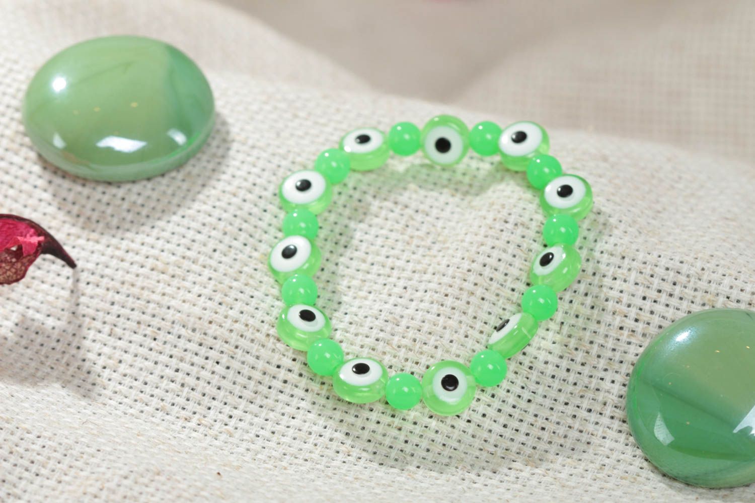 Nice green handmade children's wrist bracelet with resin and plastic beads photo 1
