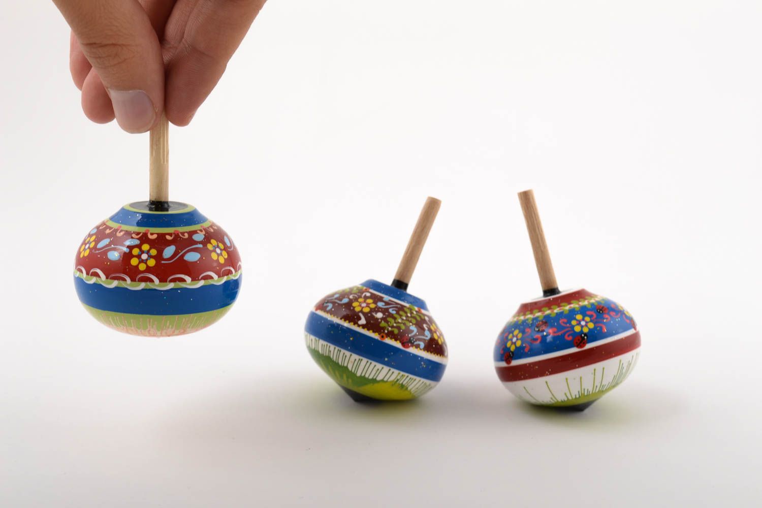 Trompos de madera artesanales regalo original juguetes para niños con ornamentos foto 5
