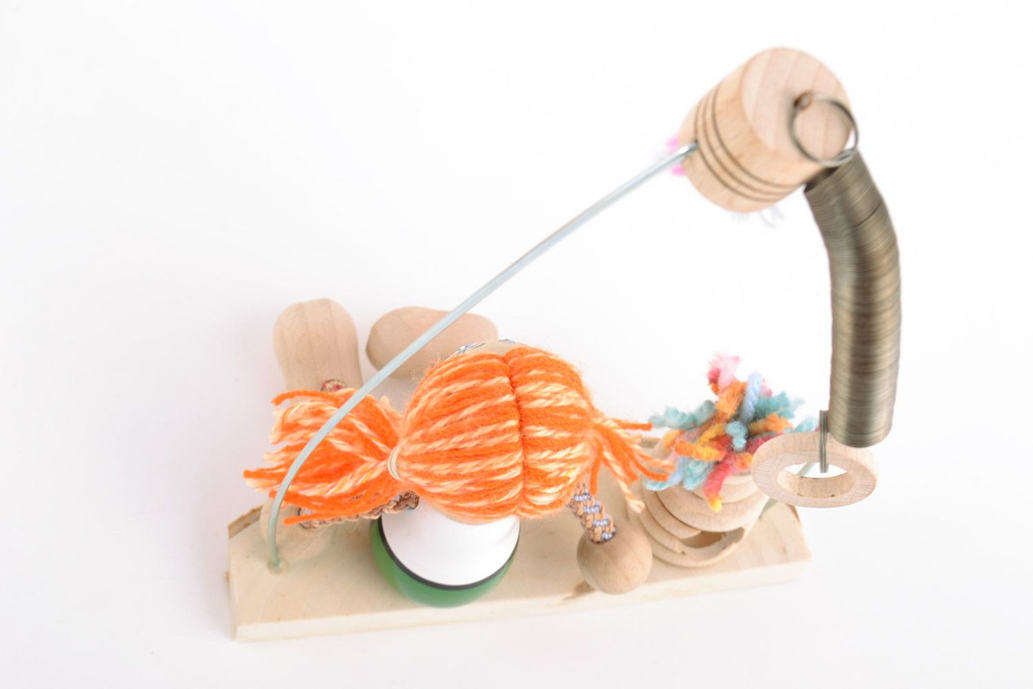 Originelles handgemachtes Öko Spielzeug aus Holz mit Sprungfeder bemalt  foto 5
