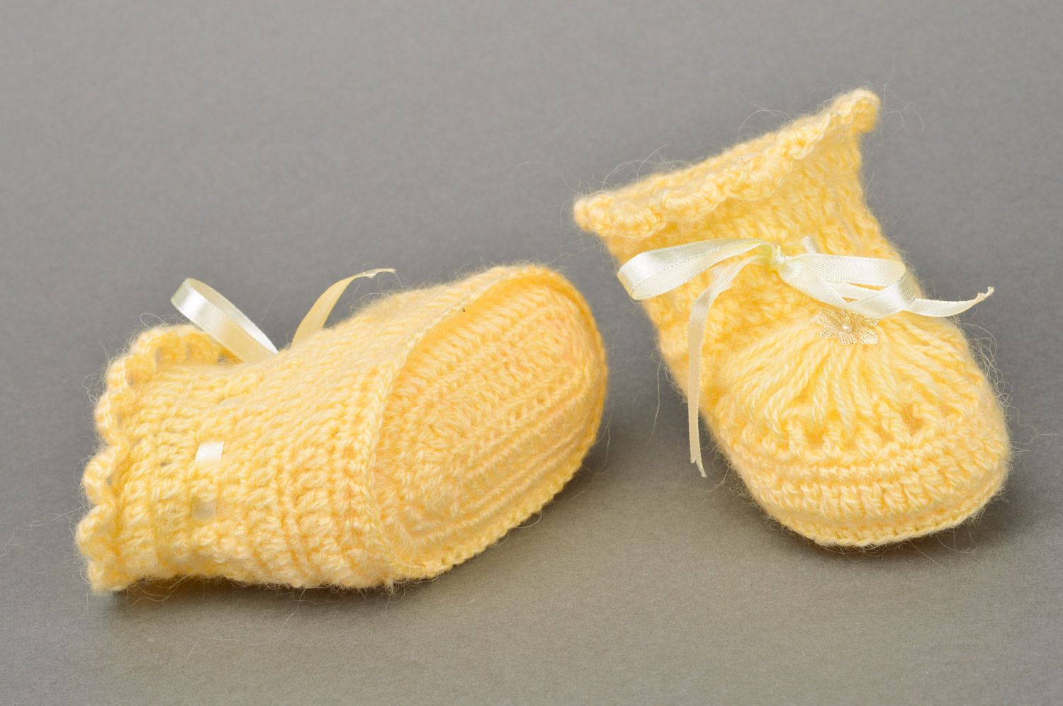 Handmade crocheted yellow baby booties made of acrylic with ribbon for girls photo 5