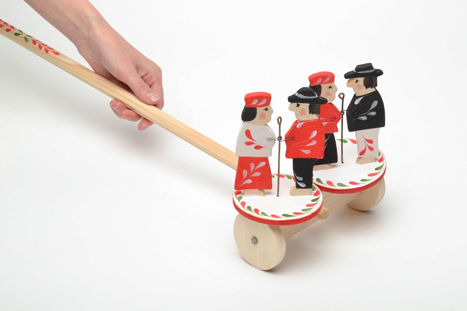 Handmade wooden wheeled toy with ethnic painting photo 5