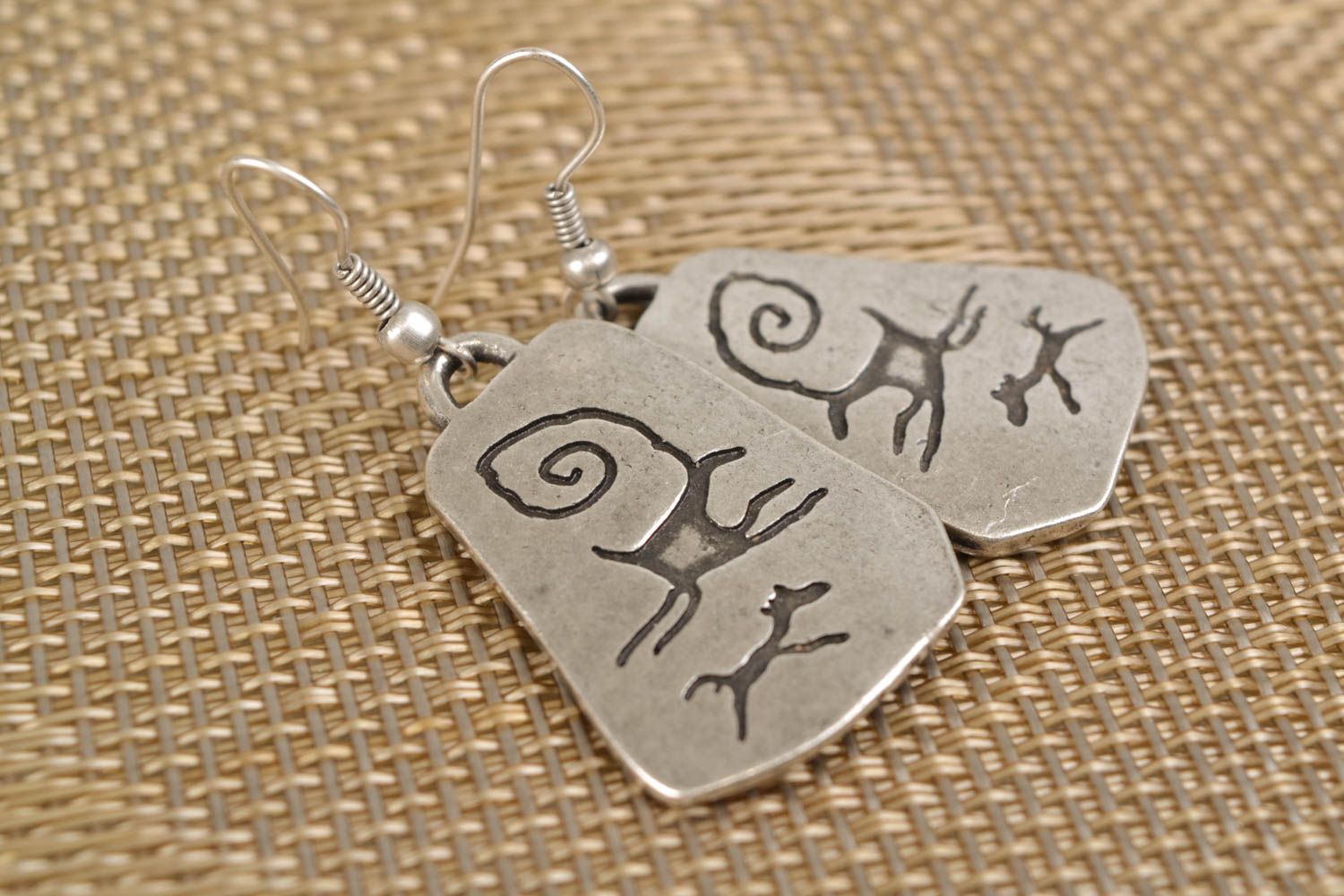 Handmade metal earrings with patterns photo 1