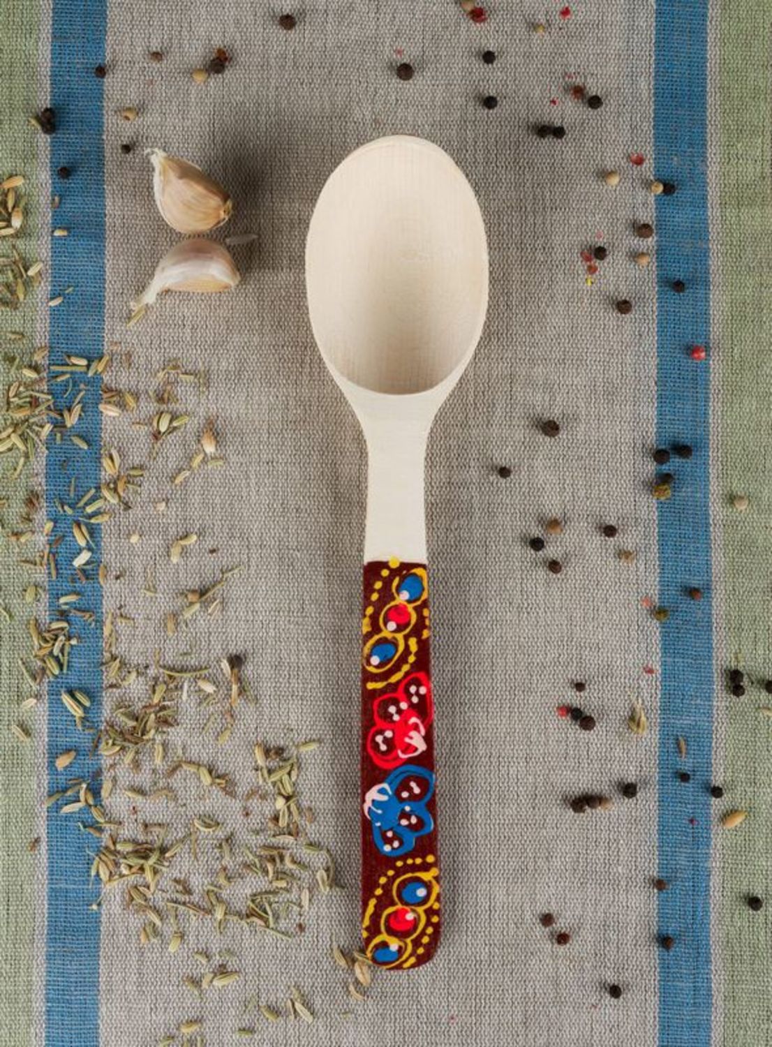 Wooden spoon with painted handle photo 1