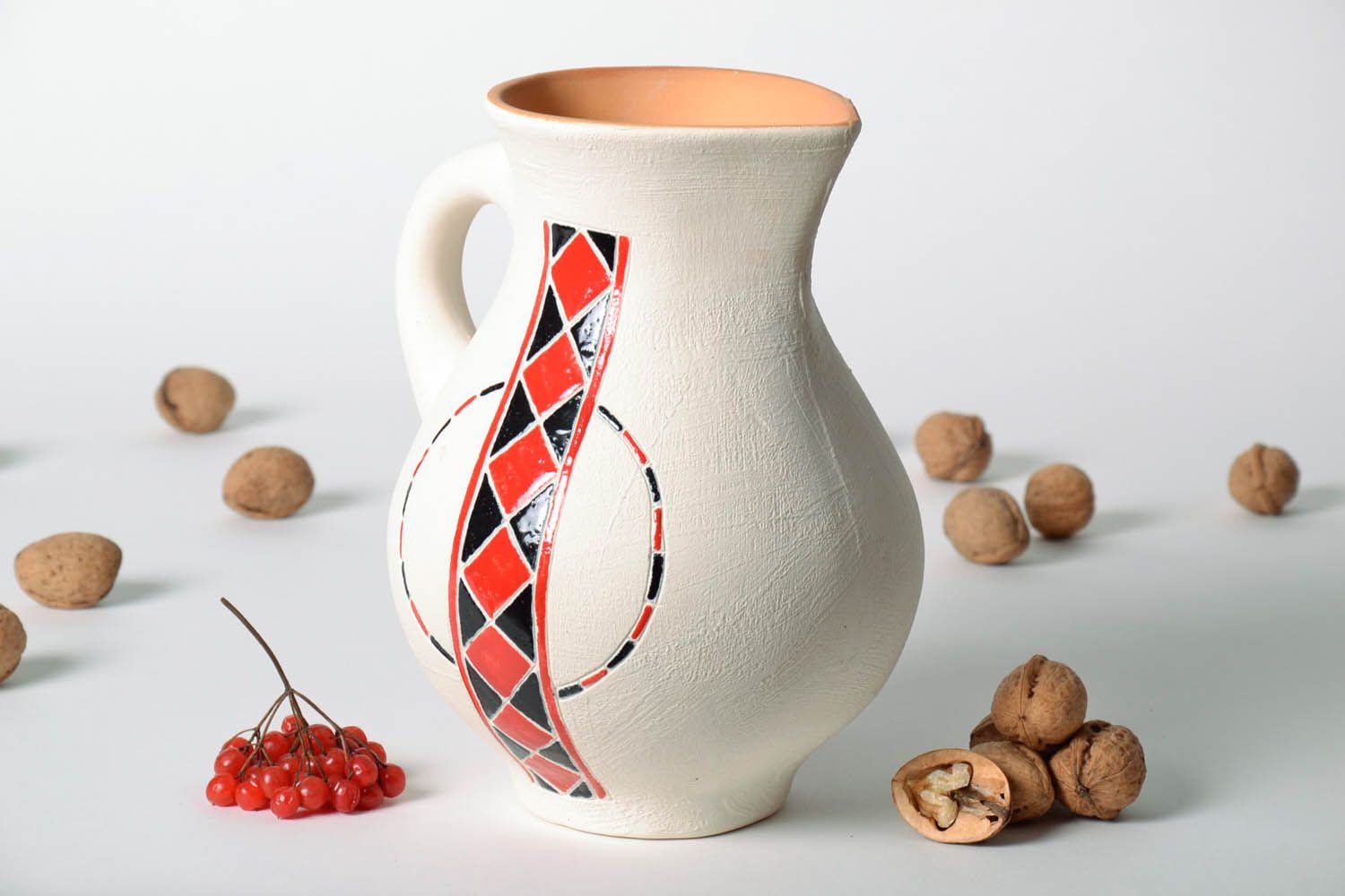 Jarro de cerámica con dibujo étnico foto 1