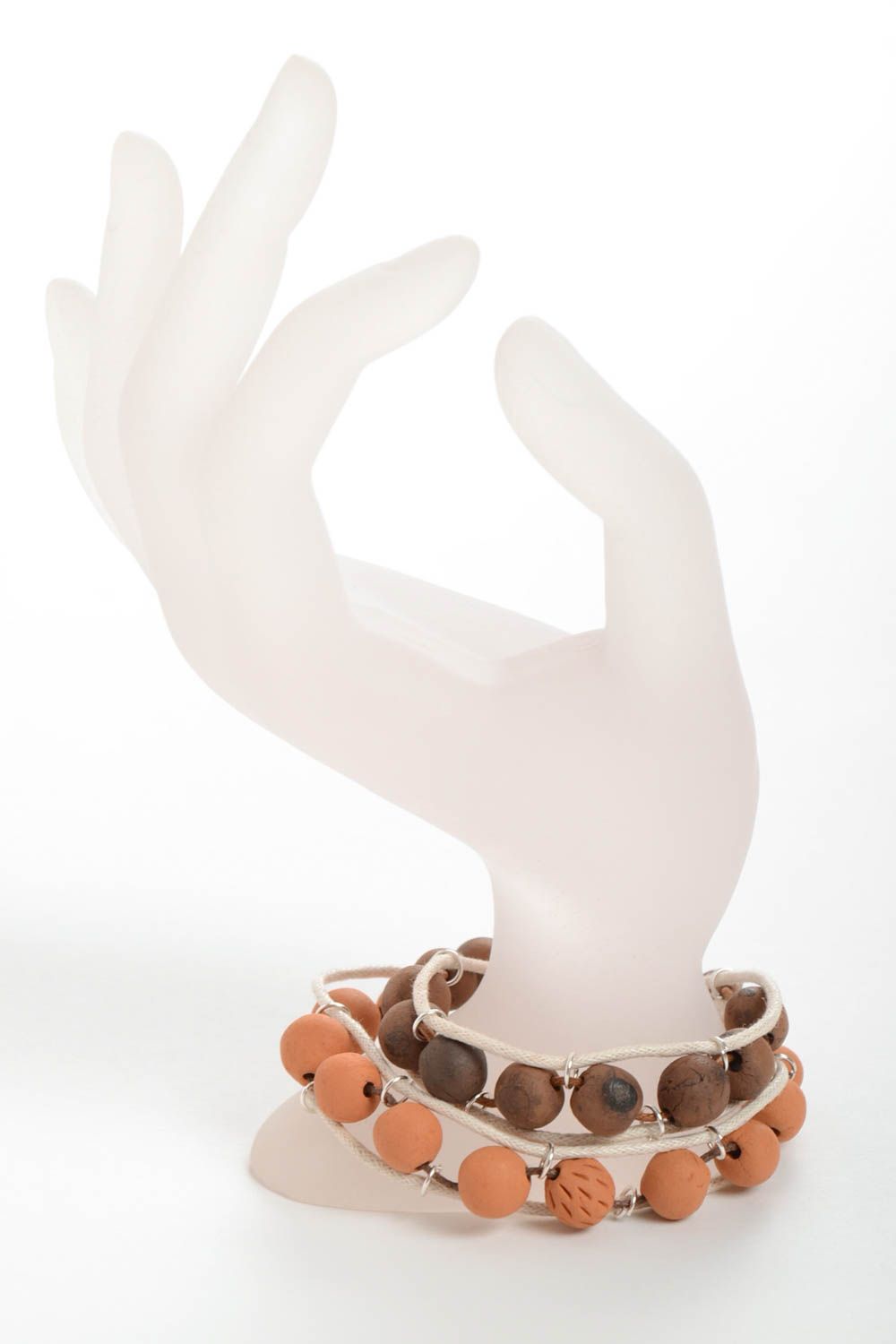 Глиняные браслеты ручной работы оригинального дизайна на вощеном шнурке 2 штуки фото 1