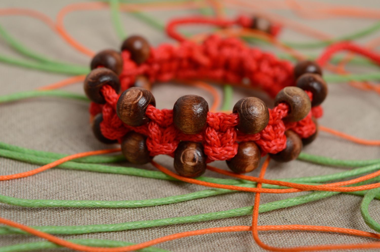 Macrame friendship bracelet with polyester cord and wooden beads photo 2