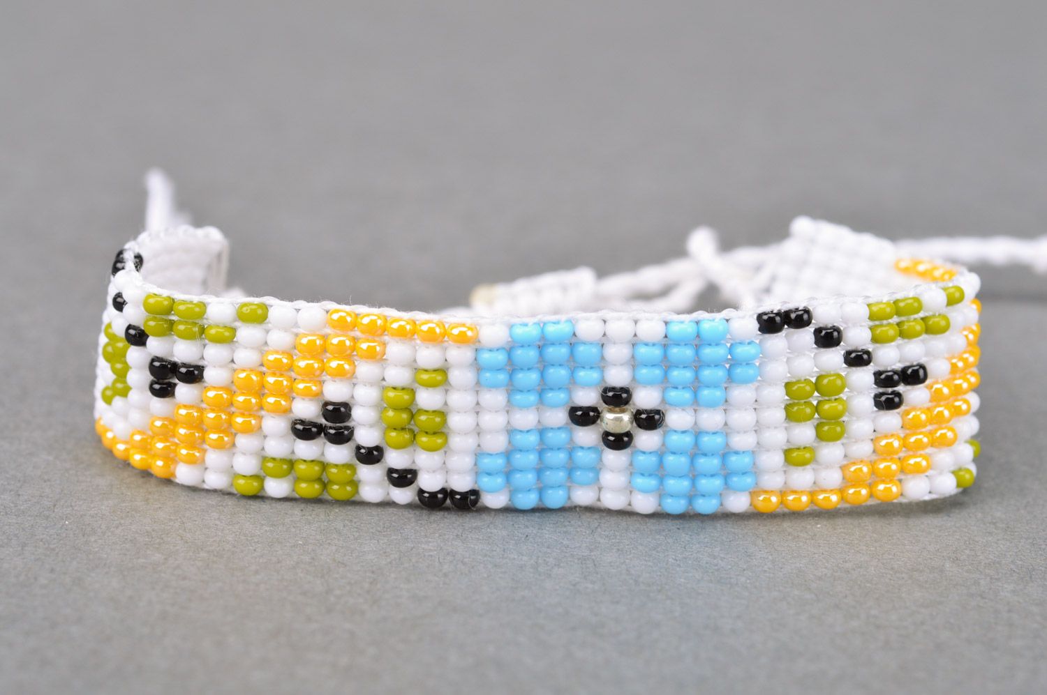 Handmade women's woven bead bracelet with ties White with Flowers photo 2