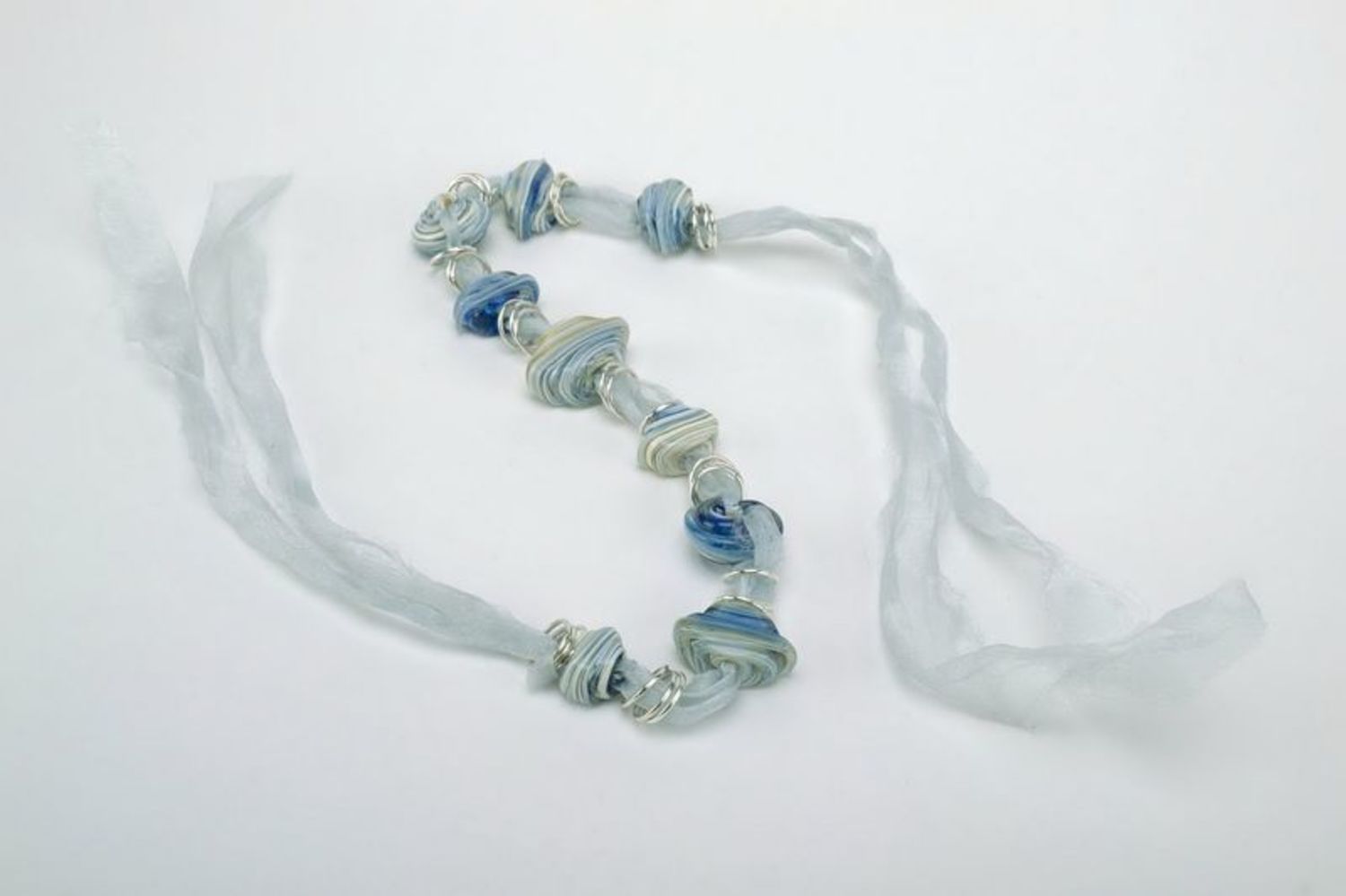 Blue tough glass necklace with leather cord photo 3