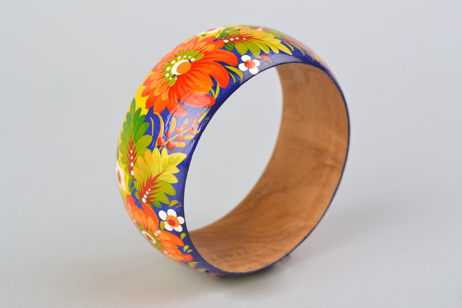 Handmade wooden wrist bracelet with traditional Petrikivka painting photo 5