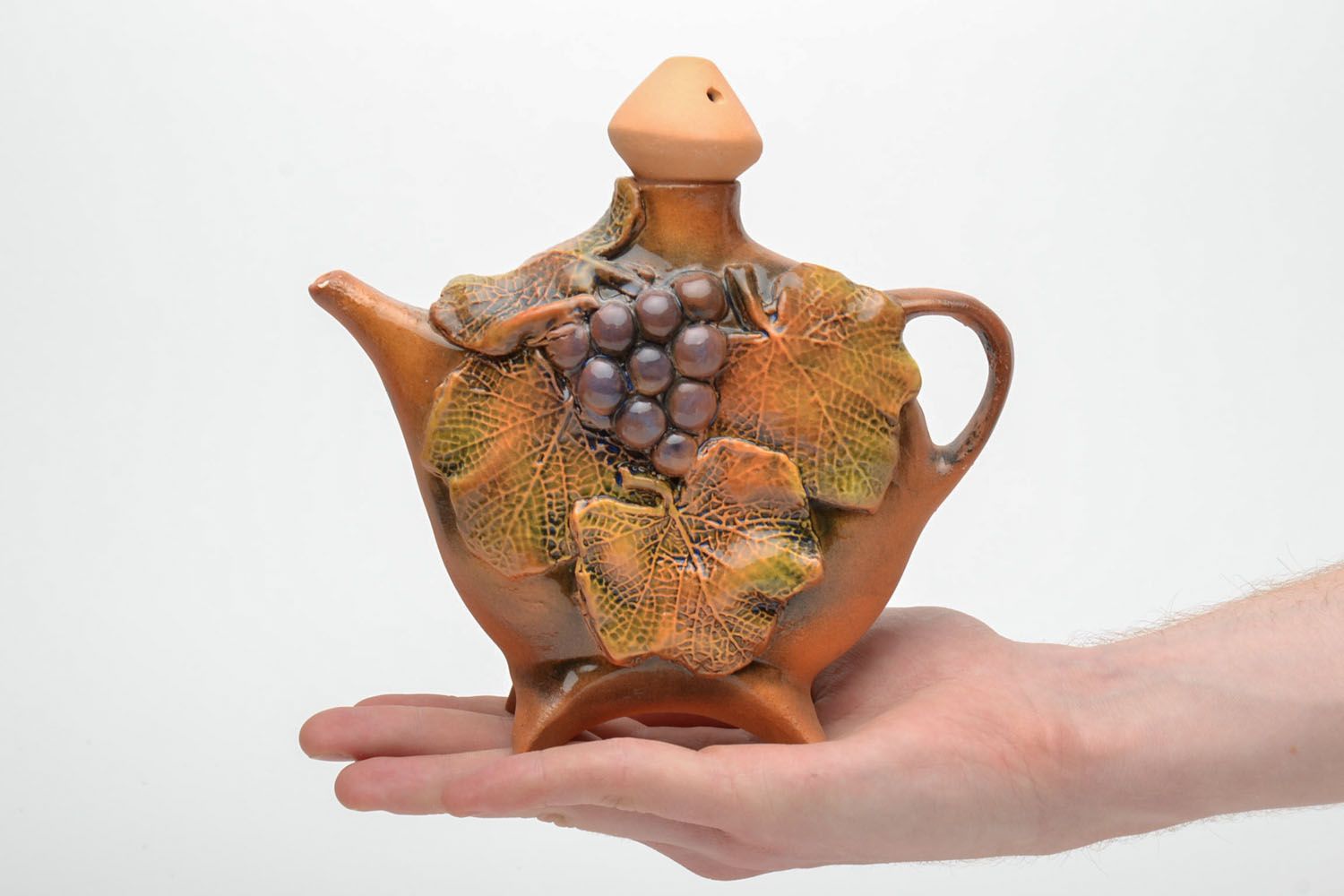 Clay teapot with grape clusters photo 5