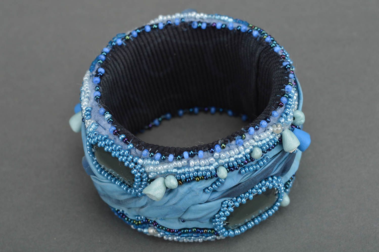 Handcrafted fabric massive handmade bracelet in blue color decorated with beads photo 3