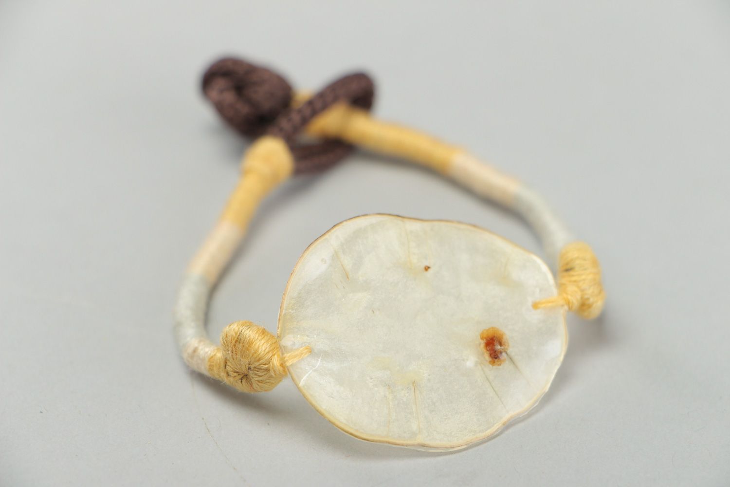 Handmade friendship bracelet with dried flowers coated with epoxy Lunaria photo 2
