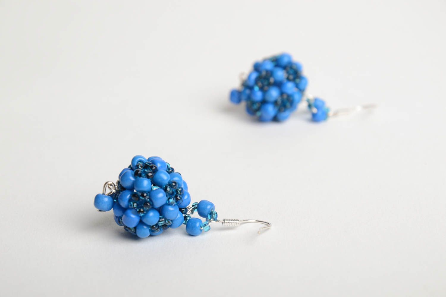 Handmade designer ball shaped dangling earrings crocheted of blue Czech beads photo 3