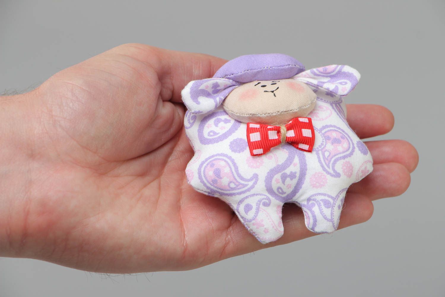 Handmade fridge magnet in the shape of soft toy lamb sewn of light cotton fabric photo 5