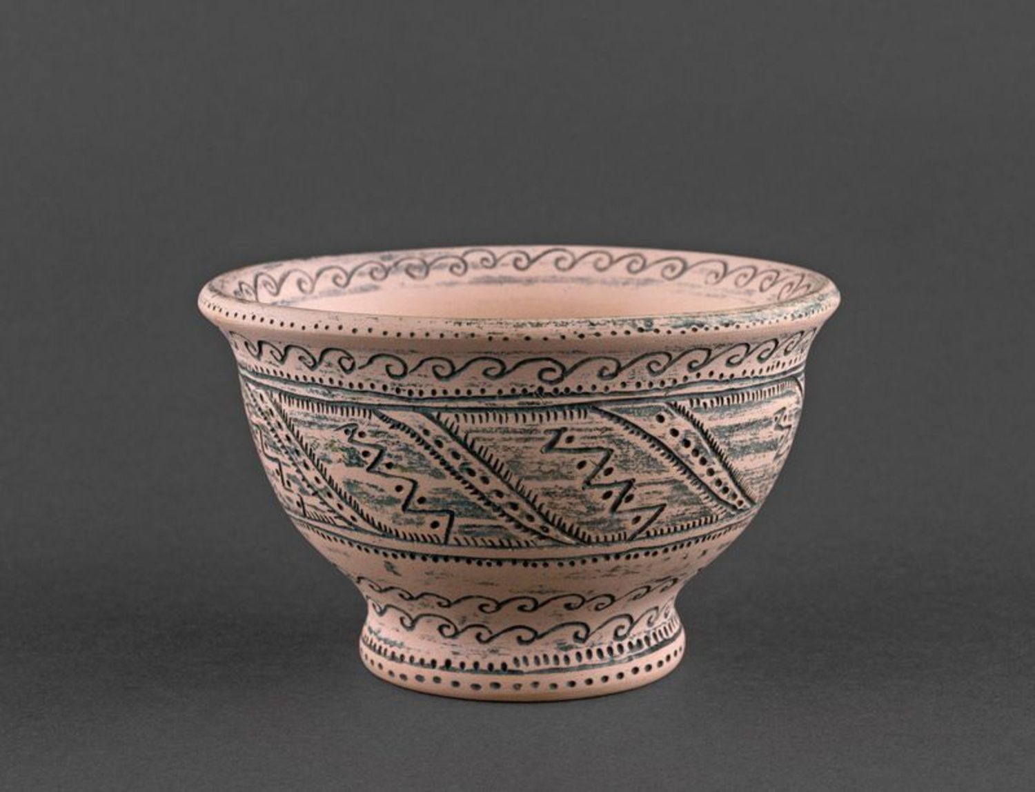 Decorative clay bowl photo 1