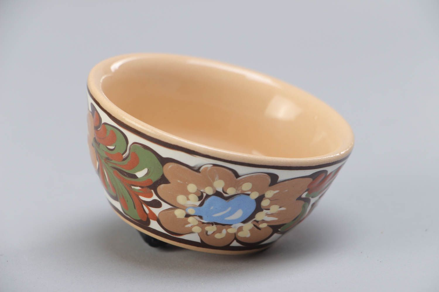 Handmade decorative small ceramic bowl ornamented with colorful glaze for sauces photo 4