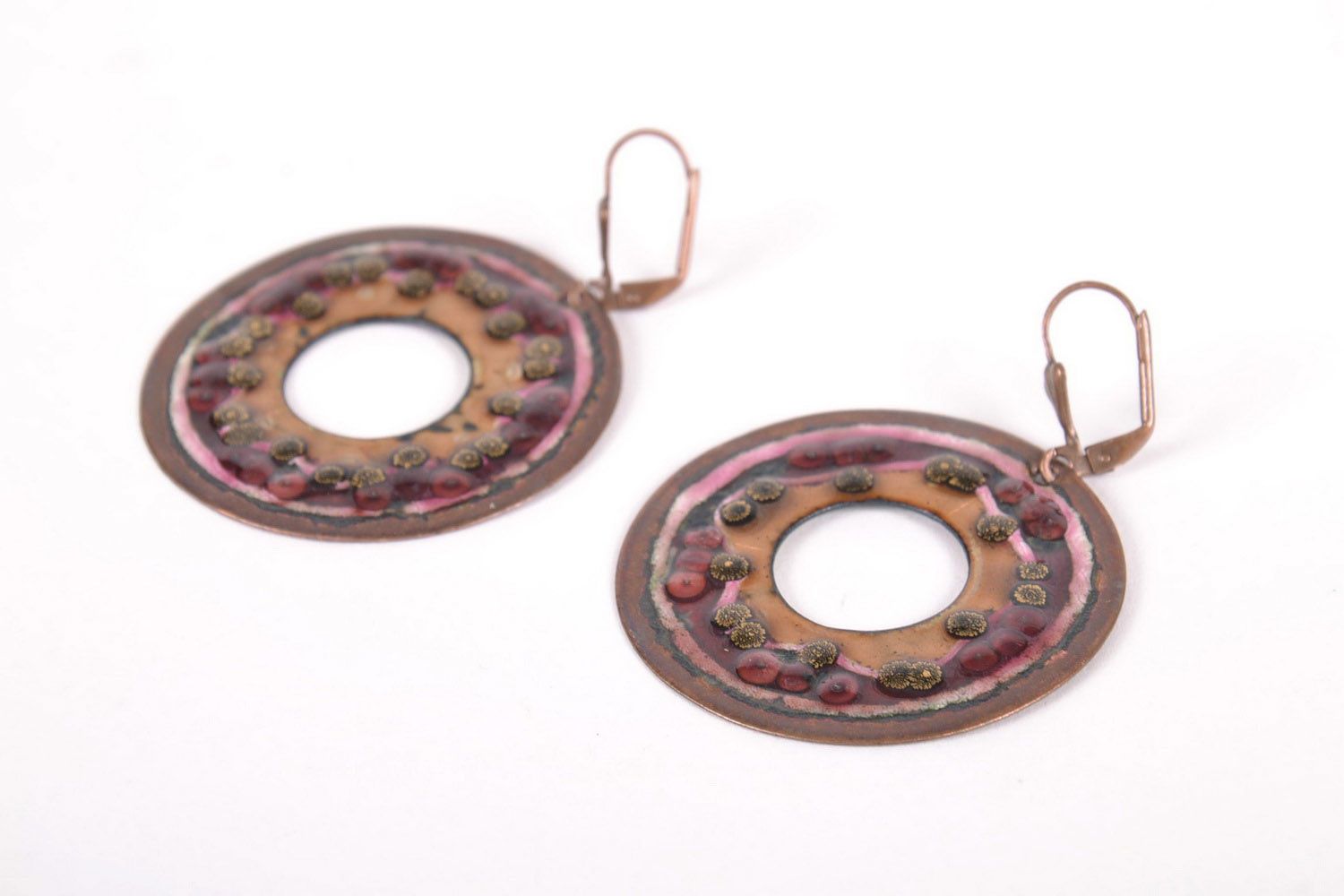 Round earrings made ​​of copper Wheel of Samsara photo 1