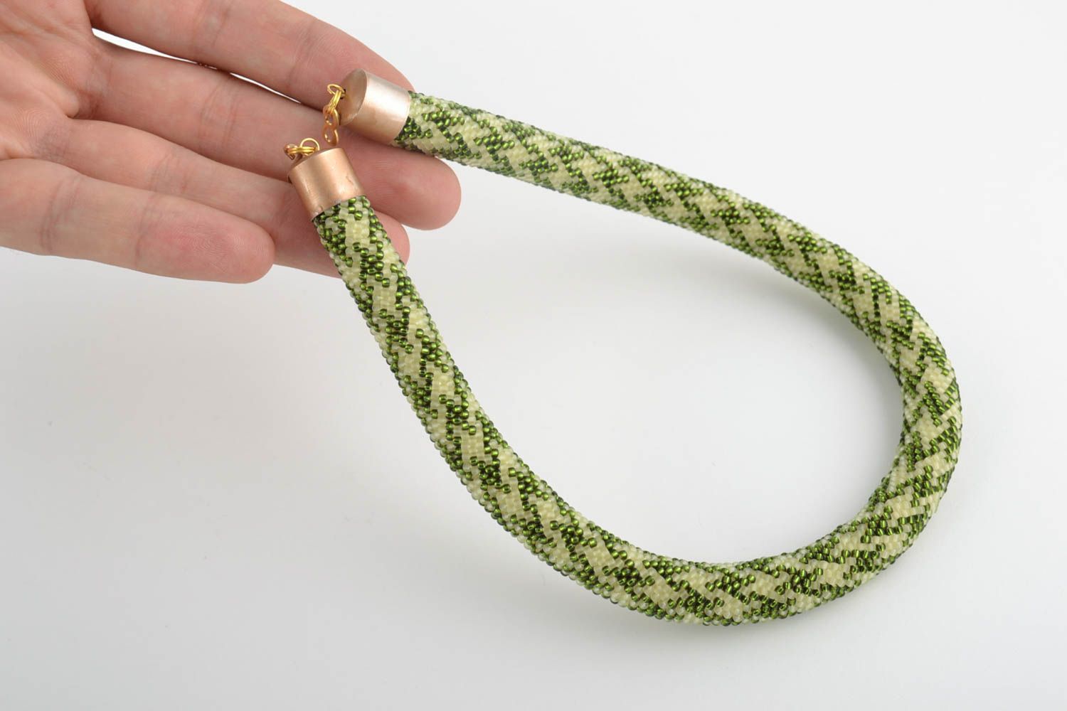 Beige and green handmade beaded cord necklace with geometric pattern photo 2
