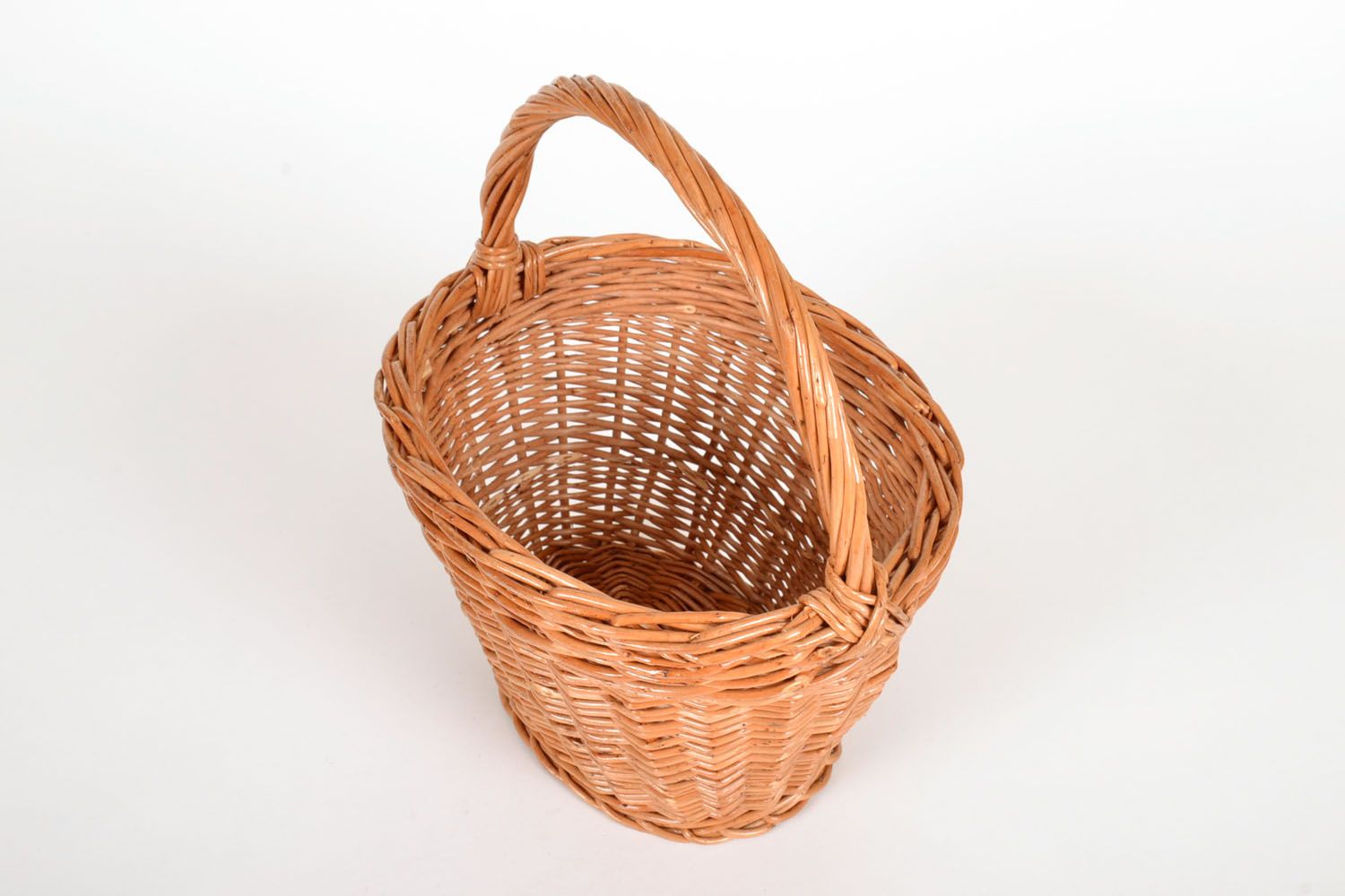 Braided basket made of vine photo 4