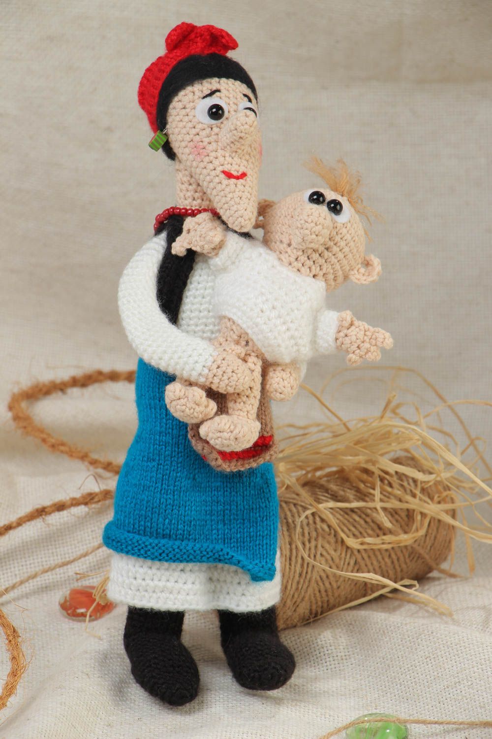 Handmade soft doll of middle size crocheted of acrylic threads Mother with Child photo 1
