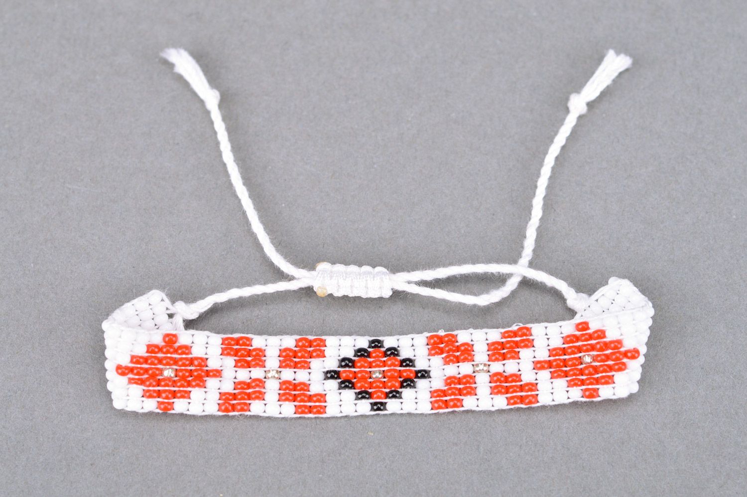 Handmade women's woven bead bracelet of white color with ornament photo 5