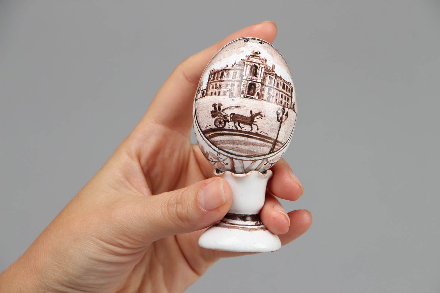 Ceramic egg on pedestal photo 4