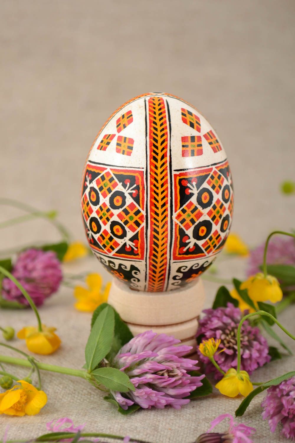 Light bright Easter egg painted with acrylics Handmade designer chicken egg photo 1