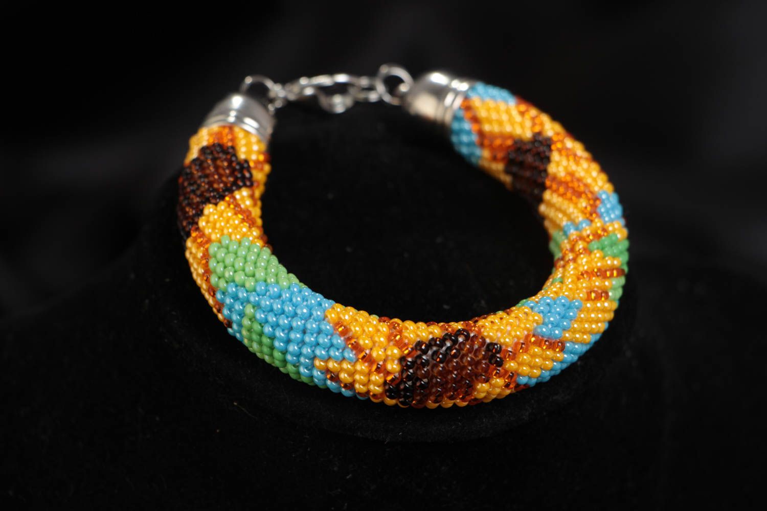 Handmade designer beaded cord wrist bracelet with bright sunflowers ornament photo 1