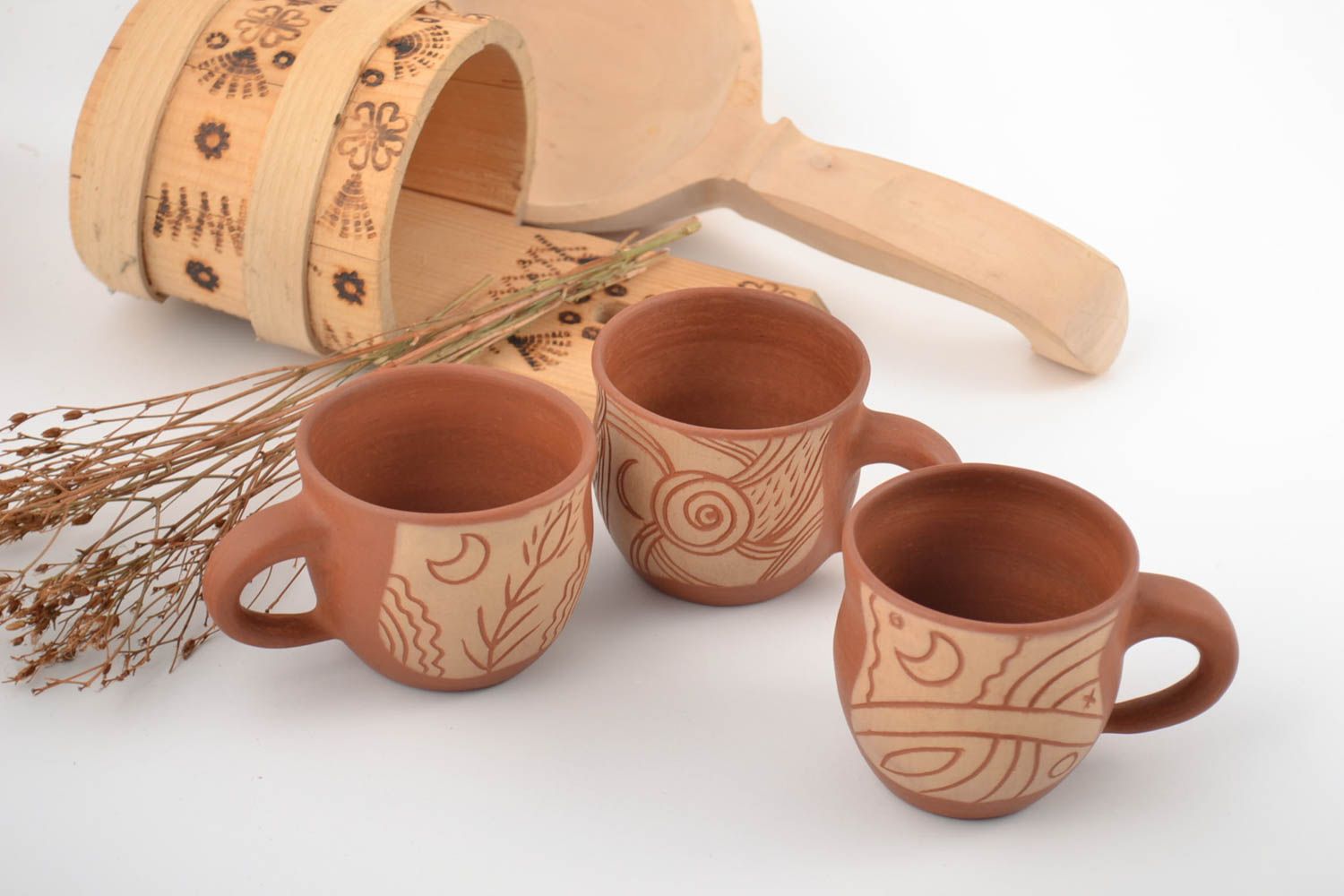 Set of 3 three ceramic cups with cave drawings in terracotta style photo 1