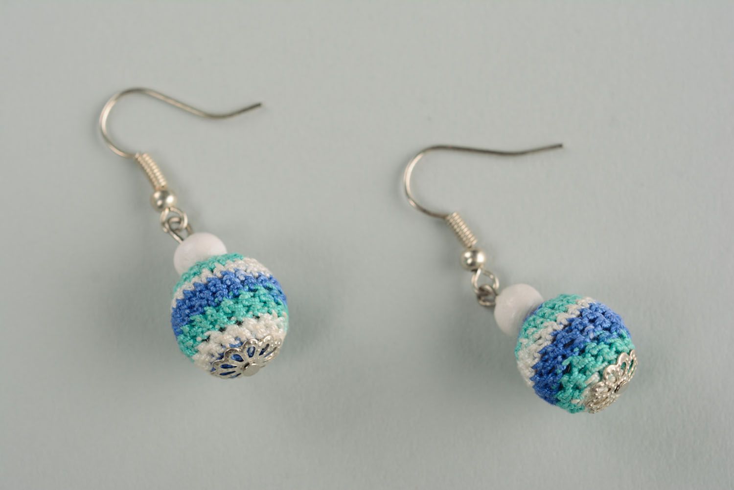 Earrings with beads crocheted over with cotton threads photo 1