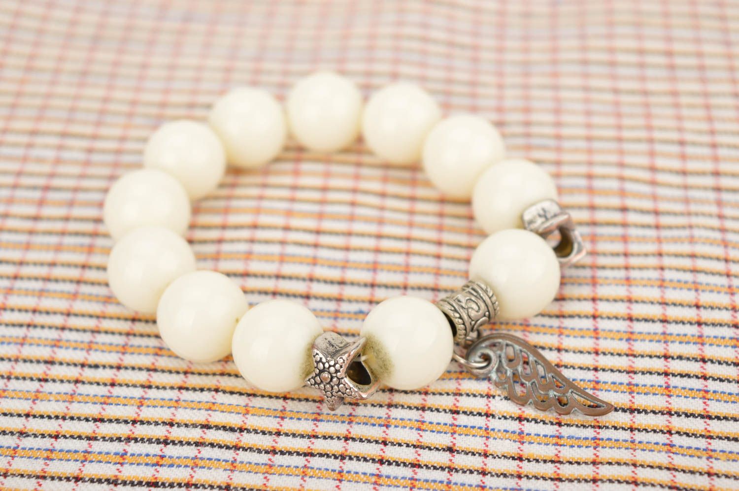 Elastic stretchy white beads bracelet with metal charms for young girls photo 2