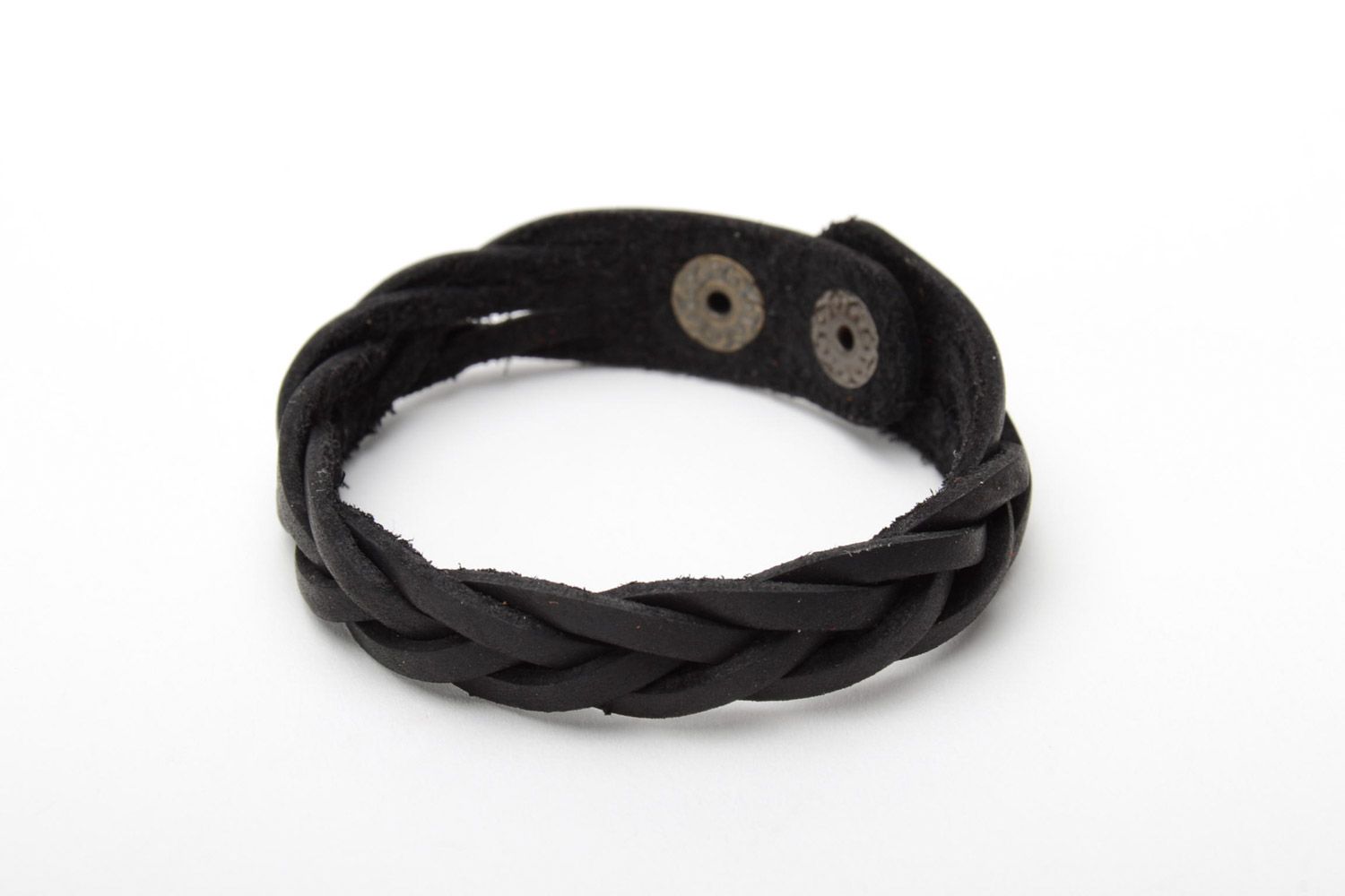 Thin handmade bracelet woven of black genuine leather with metal studs photo 3