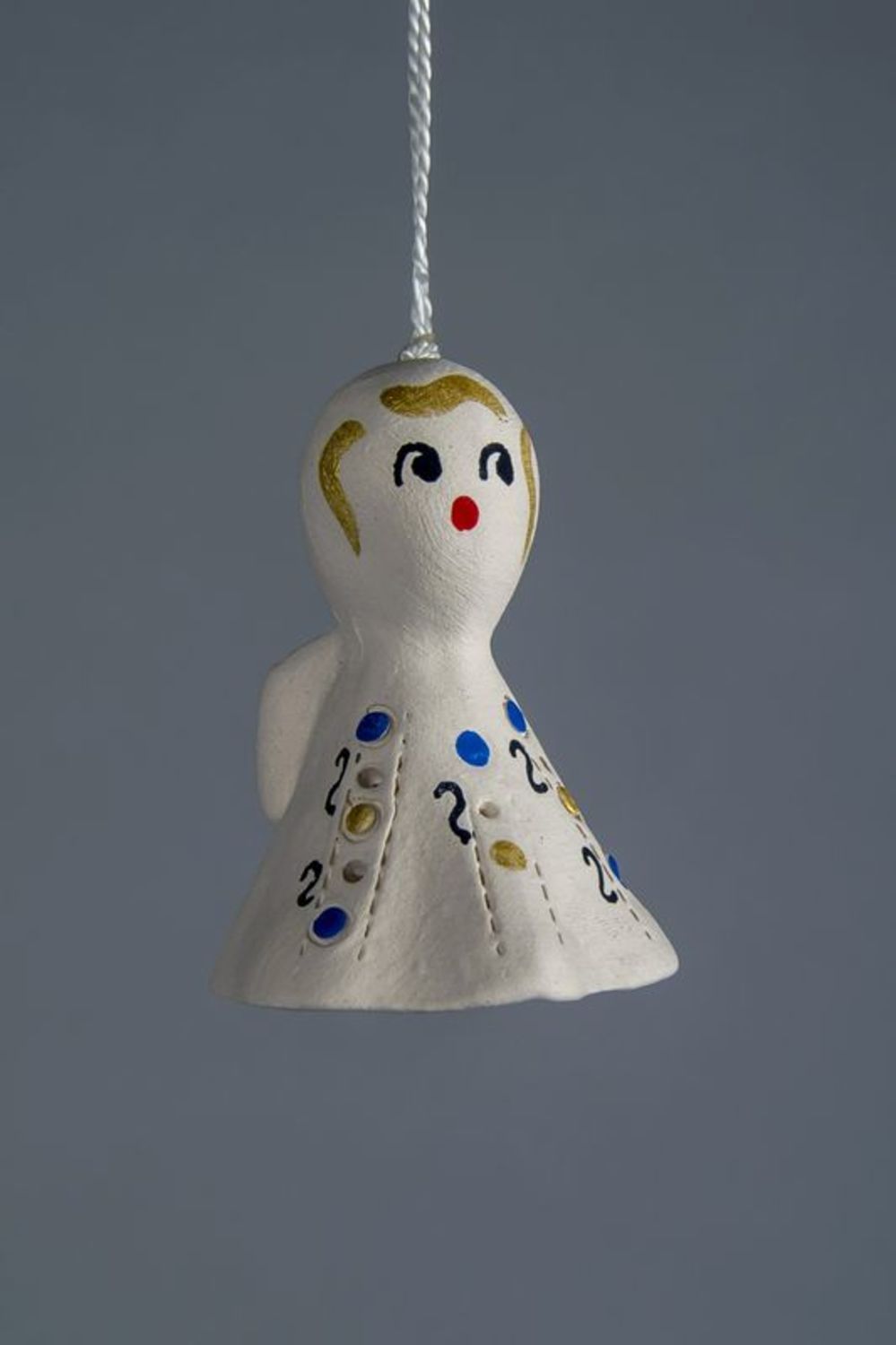 Ceramic bell in the style of primitivism photo 1