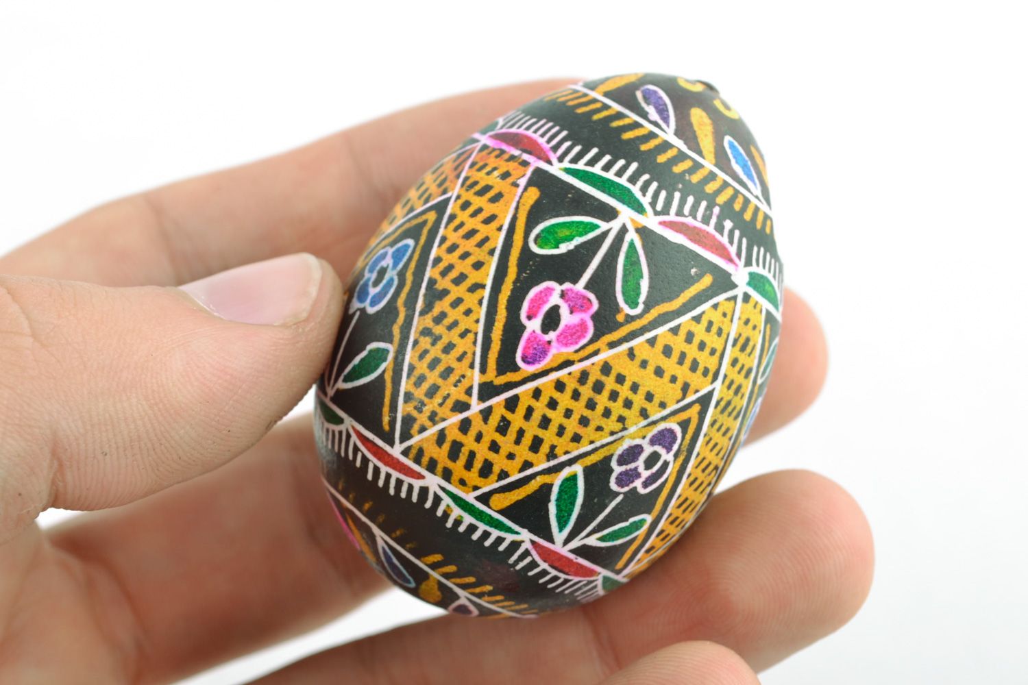 Handmade Easter egg with floral ornament painted with hot wax and aniline dyes photo 2
