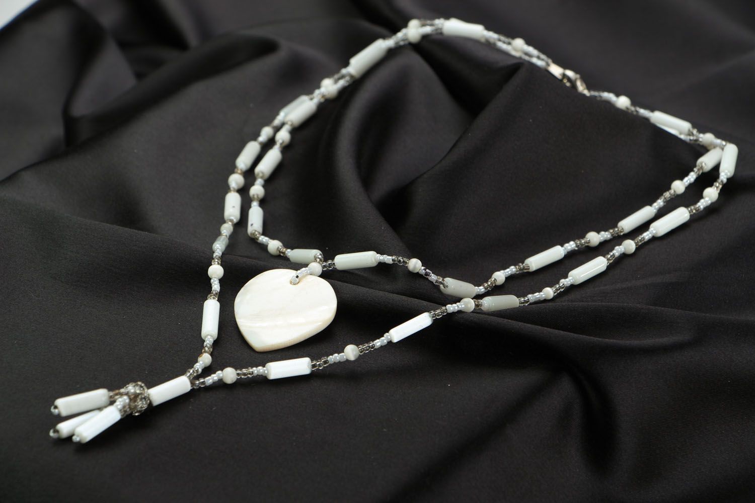 Necklace with white cat's eye stone photo 2