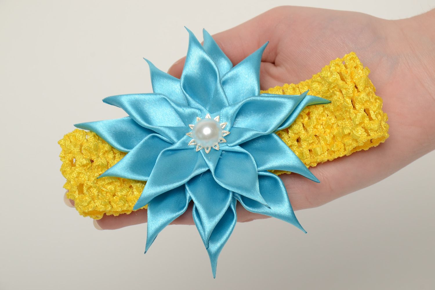Gelbes Haarband mit Blume blauer Farbe foto 5