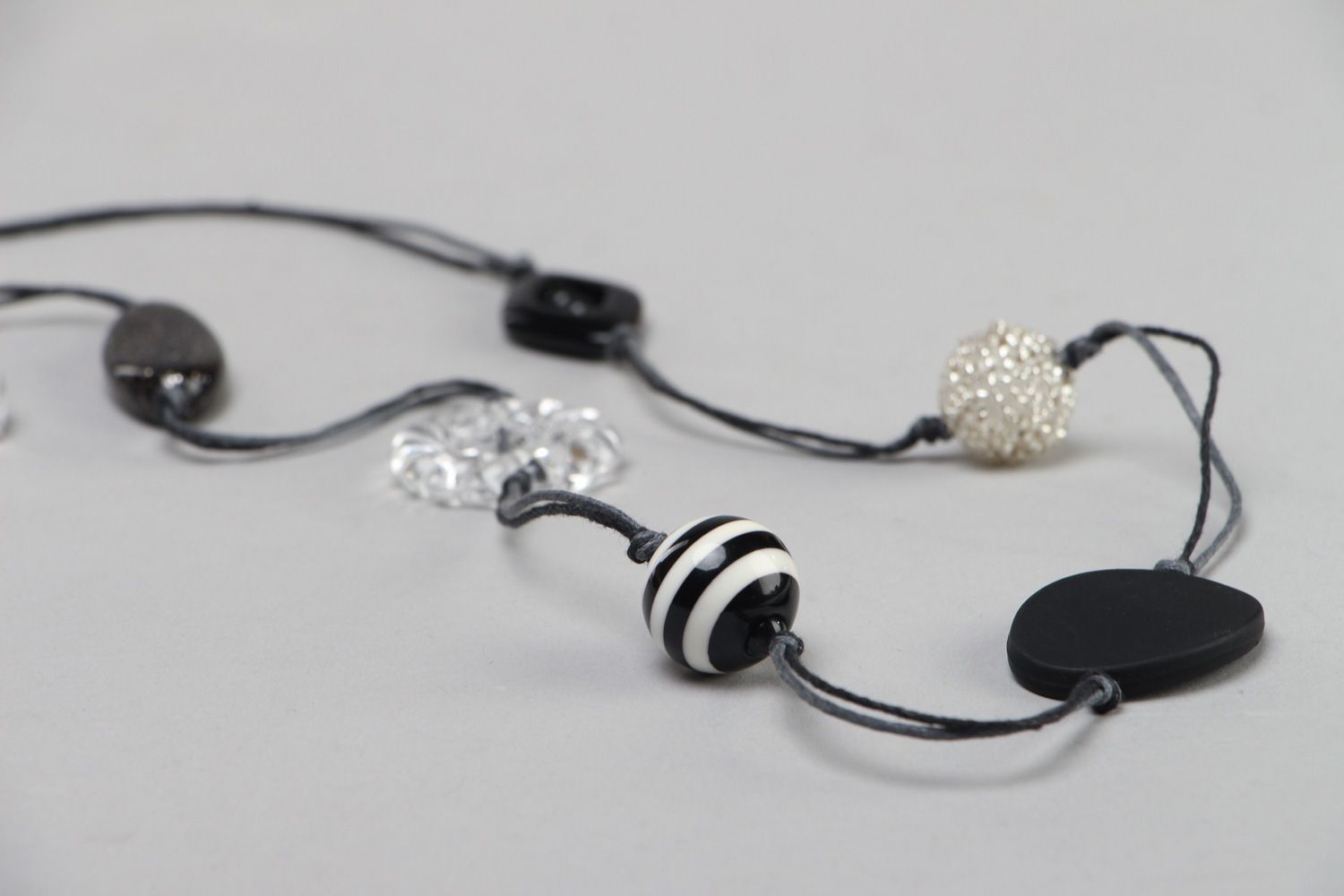 Handmade long black and white necklace with plastic beads of different shapes  photo 3