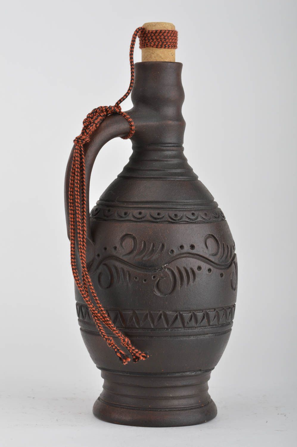 Handmade dark brown ceramic decorative bottle ornamented in ethnic style 700 ml photo 1