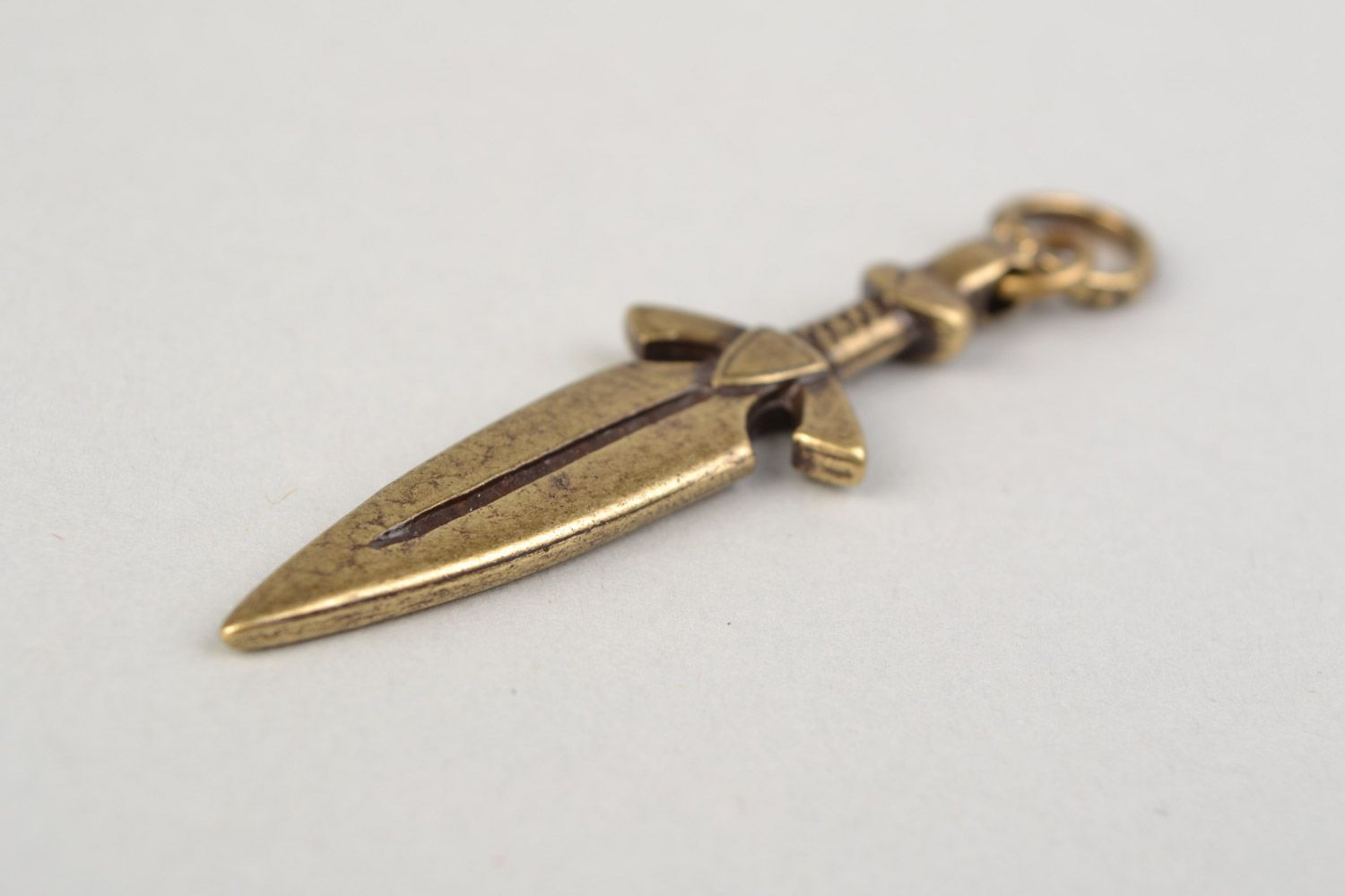 Handmade pendant in the shape of bronze knife cast with the use of permanent mold photo 5